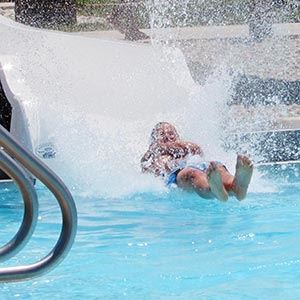 Young Person Going Off Slide