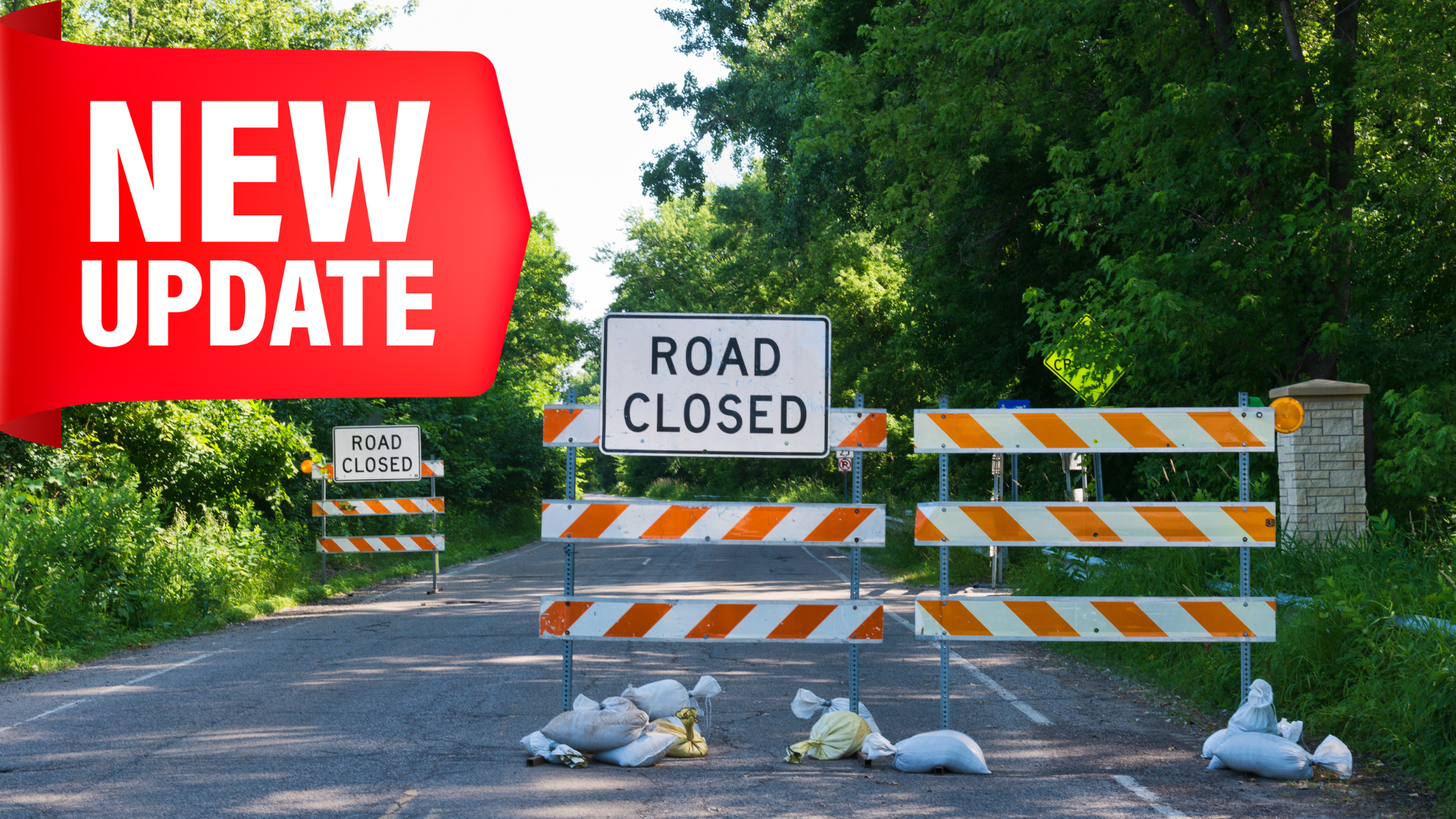 Road Closed Barrier, wooded road, red UPDATE flag